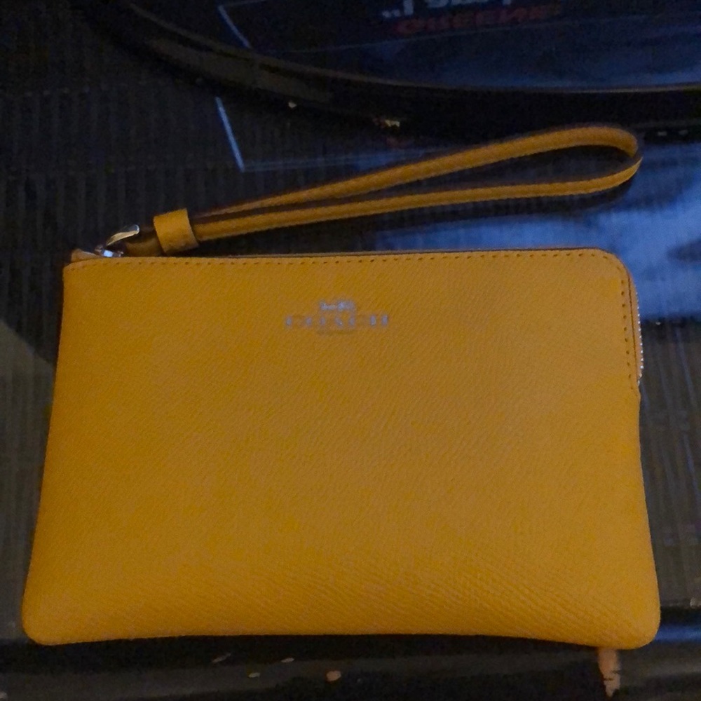 Yellow leather coach wristlet